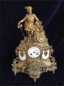 An interesting Mantle clock with Highlander situated on the top.