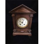 An Oak clock, tabernacle style