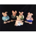 A full set of Natwest Piggy Banks by Wade with original folder