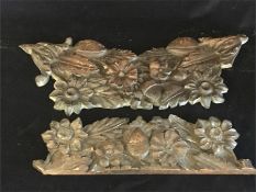 A pair of French oak carvings