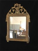 A Louis XVI gilt framed mirror