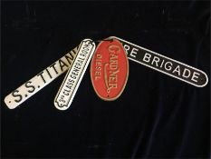 Four Assorted Cast Iron Signs