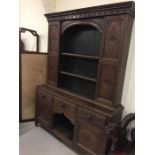 A Carved oak dresser c.1900 Base 202cm x 146cm