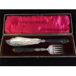 A boxed case of Fish serving knife and fork.