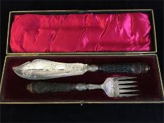 A boxed case of Fish serving knife and fork.