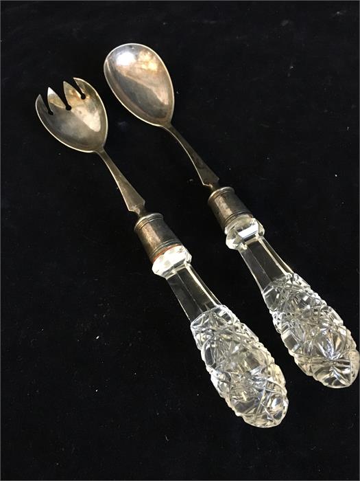 A pair of silver and glass handled salad servers, hallmarked Birmingham 1903-04, makers mark BB