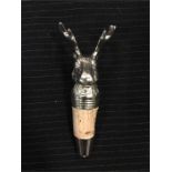 A plated stag head wine bottle stopper