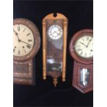A Selection of three wall clocks in need of repair