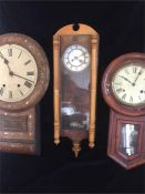 A Selection of three wall clocks in need of repair