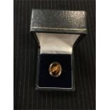 A Tigers eye ring in a silver mount