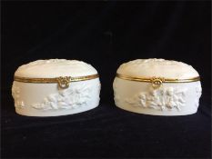 Two Coquet Limoges France porcelain and gilt hinged boxes with Cherub decoration