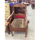 A Commode, chair with carved detail, original Green & Co bowl and leopard print seat.