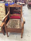 A Commode, chair with carved detail, original Green & Co bowl and leopard print seat.