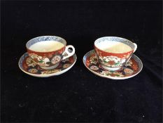 A Pair of Imari Tea Cups and Saucers