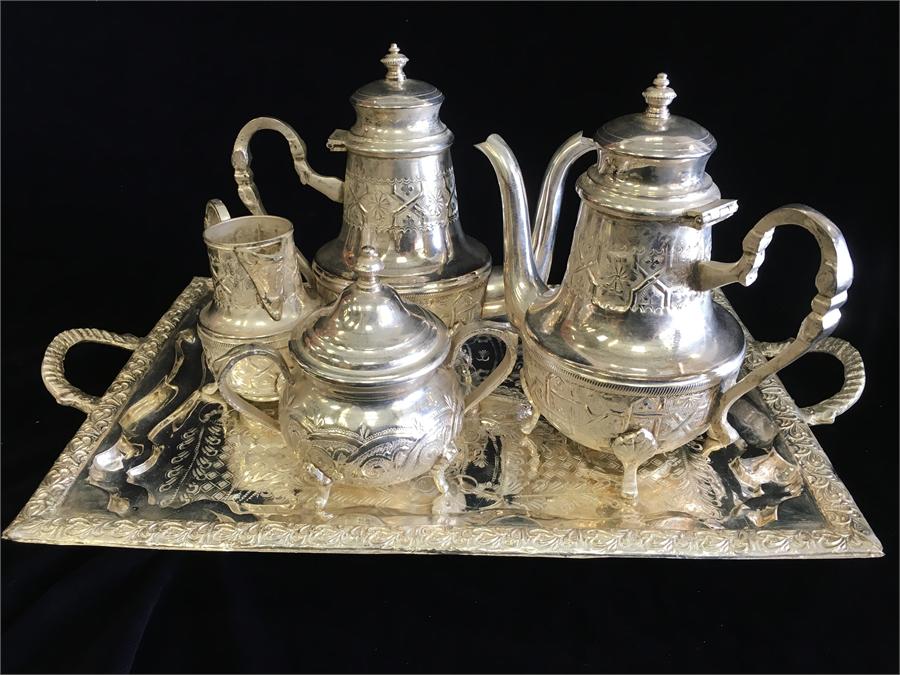 Persian white metal four piece tea set on tray