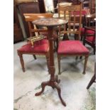 A Mahogany plant stand.