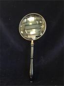 A silverplate 6" magnifying glass