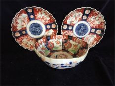 Two Imari scalloped edged dishes and an Imari bowl