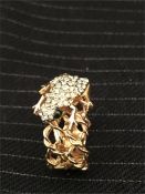 A Costume jewellery ring with Frog motif and 18k plated fitting.