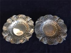 A pair of hallmarked silver dishes