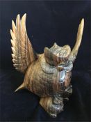 A wooden carved Balinese owl