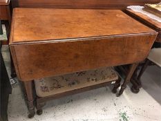 An Oak drop leaf table