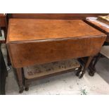 An Oak drop leaf table