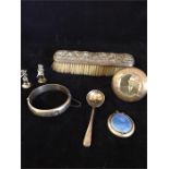 A selection of silver items to include a compact, spoon, brush etc.