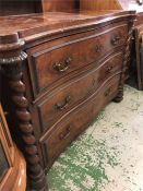 A Serpentine fronted three drawer chest of drawers