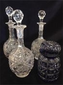 Four glass decanters