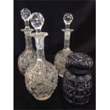 Four glass decanters