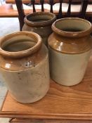 Three brown stoneware pots