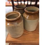 Three brown stoneware pots