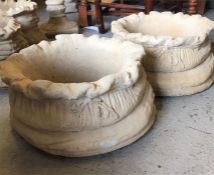 A pair of Garden stoneware sack planters, large