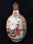 A Chines vase, converted to lamp base.