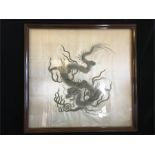 An antique Chinese silk of a Dragon, framed.