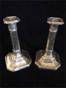 A Pair of silver candlesticks, hallmarked Birmingham 1915-16