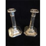 A Pair of silver candlesticks, hallmarked Birmingham 1915-16