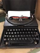 An Envoy case typewriter