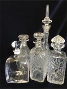 A selection of crystal and cut glass decanters
