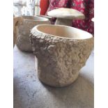 A Pair of Garden stoneware circular planters festooned with roses