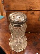 A silver topped sugar sifter