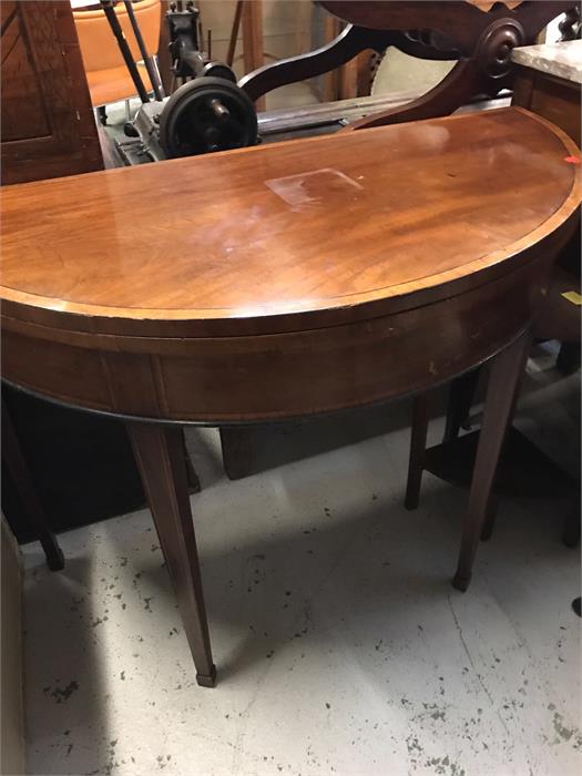 A Mahogany card table