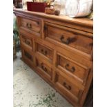 An Indian hardwood two over six chest of drawers