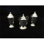 A silver Cruet set hallmarked Birmingham 1946 makers mark B.Ld, Bishtons Ltd (Total Weight 140g)