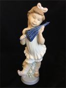 Lladro figure of a girl with an umbrella