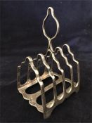 A Silver toast rack, hallmarked Sheffield, makers mark J.D & S (119g)