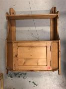 A Pine display shelf with small cupboard