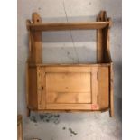 A Pine display shelf with small cupboard