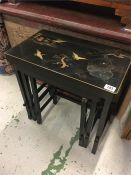 A nest of lacquered Chinese tables